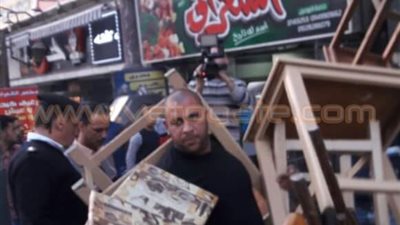 بالصور.. حملة مكبرة لإزالة الإشغالات بشارع فيصل