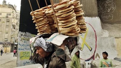 غرب القاهرة: رفع 12 بائعا متجولا بمجمع التحرير وكورنيش النيل