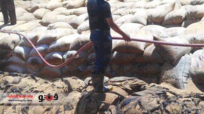 بالصور.. الحماية المدنية تسيطر على حريق بشونة البنك الزراعي بأبوتيج