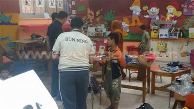 بالصور.. «شباب بيحب الخانكة» توفر ملابس العيد لغير القادرين