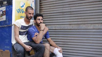 14  صورة ترصد حزن وصدمة سكان عقار قصر النيل المنهار