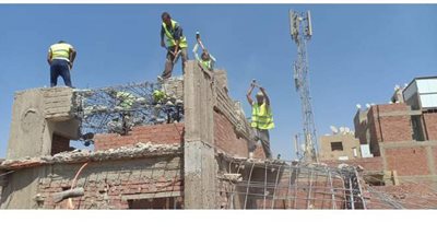 حى بولاق الدكرور يزيل عقارا