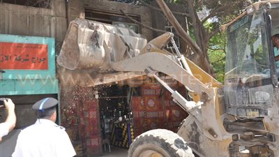 بالصور.. حملة لتطهير مدينة الإعلام بالعجوزة من الإشغالات