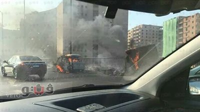 بالصور.. آثار حريق سيارة أعلى محور المريوطية