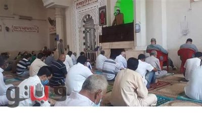 أهالي المنوفية يؤدون صلاة الجمعة  بالكمامة  | صور