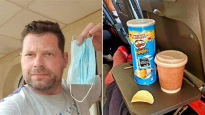 راكب  يتحايل على قوانين ارتداء الكمامة بتناول 