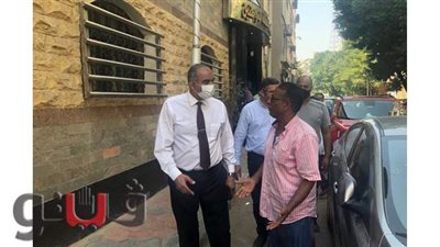 تركيب بالوعات لمواجهة الأمطار بشوارع الدقي | صور