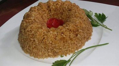 طريقة عمل أرز السمك البني
