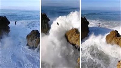 موجة عملاقة تصيب متهور يسير أعلى حبل (فيديو وصور)