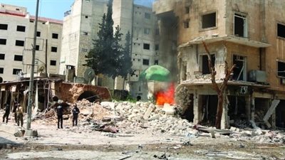 معارك كر وفر بين مسلحي داعش والقاعدة في مخيم اليرموك بسوريا