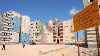 بالصور..العلمين الجديدة تتزين لاستقبال السيسي