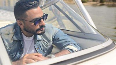 تامر حسني يحتفل مع نجيب ساويرس بنجاح أغنية 