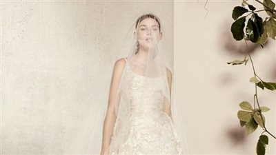 بالصور.. تصميمات رائعة لفساتين زفاف 2018