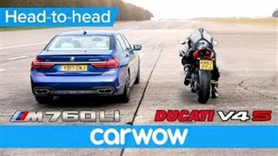 سباق التسارع مع الدراجة النارية وسيارة بى إم دبليو (فيديو)