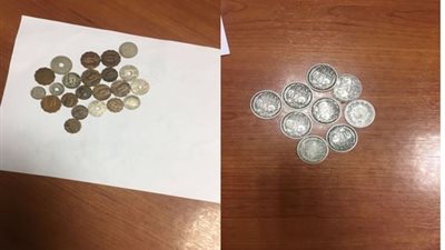 ضبط شخصين بحوزتهما 31 عملة معدنية أثرية في مطار القاهرة