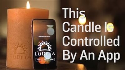 بالفيديو.. إشعال شمعة بالهاتف الذكى