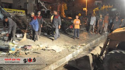 بالصور والفيديو.. هيئة النظافة تبدأ رفع مخلفات حادث وزير الداخلية