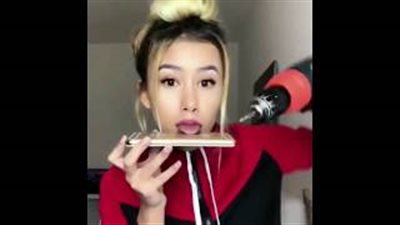 فتاة تثقب لسانها بـ«شنيور» تثير رعب الإنترنت (فيديو)