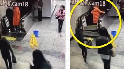 بالفيديو والصور.. نجاة زوجين من حادث مروع لتحطم سلم كهربائي