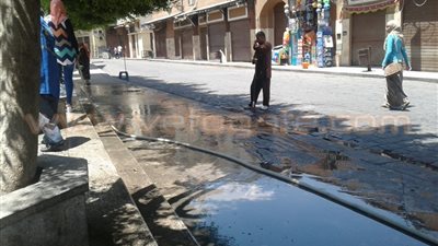 بالصور.. حملة نظافة بمحيط «الحاكم بأمر الله» احتفالا بذكرى 30 يونيو