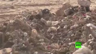 بالفيديو.. العثور على 100 جثة مقطوعة الرأس لضحايا داعش في الموصل