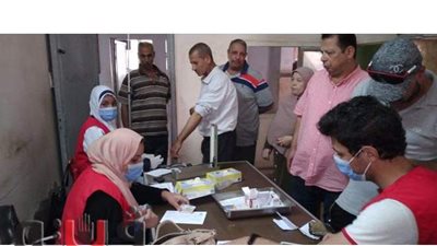 حي أوسيم يوقع الكشف الطبي على المواطنين في مبادرة 100 مليون صحة | صور