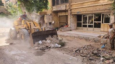 محافظة الجيزة تبدأ أعمال رصف محاور مرورية في 5 مناطق | صور