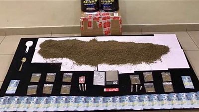 حبس تاجر مخدرات ببولاق الدكرور وتحريز المضبوطات