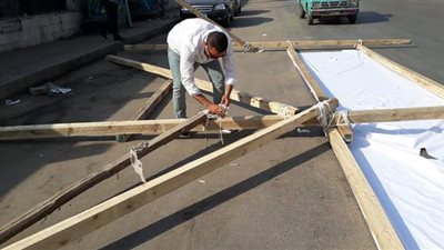 إزالة بوابات الدعاية الانتخابية المخالفة  بحي جنوب الجيزة | صور