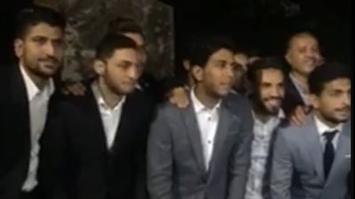 لاعبو الأهلي يحتفلون بدرع الدوري أمام النصب التذكاري للشهداء (فيديو)