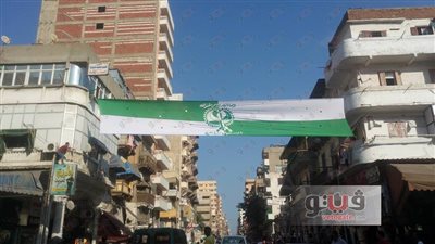 بالصور.. لافتات مشجعي المصري البورسعيدي تغزو شارع الثلاثيني