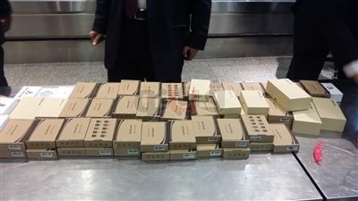 إحباط تهريب 94 جهاز تجسس عبر الأقمار الصناعية بمطار القاهرة