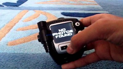 ضبط ساعة يد مزودة بكاميرا تجسس داخل طرد بمطار القاهرة