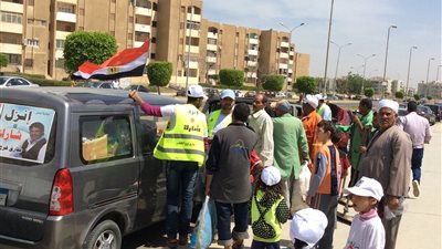 مسيرات لحث المواطنين على المشاركة في الانتخابات بالشيخ زايد (صور)