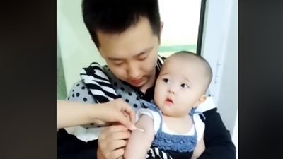 رد فعل غريب لطفلة تأخذ حقنة (فيديو)