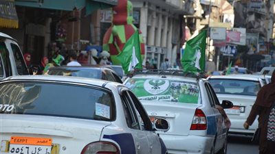 بالصور.. سيارات بورسعيد تكتسي بـ«الأخضر» قبل نهائي الكأس