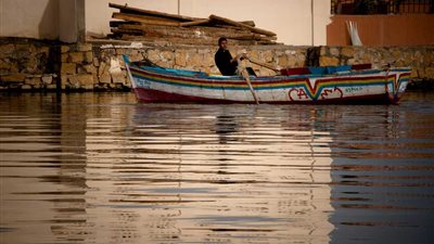 ردم منفذ مصرف الوادي يهدد بزيادة التلوث في بحيرة قارون