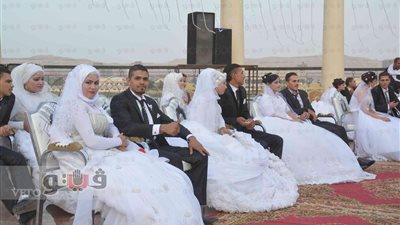 بالصور.. محافظ المنيا يشهد حفل زفاف جماعي لـ60 عريسًا وعروسة