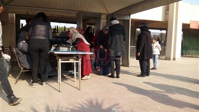 الشرطة النسائية تنتشر على بوابات معرض الكتاب (صور)