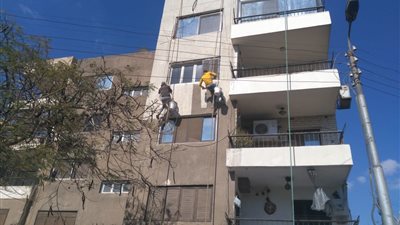 طلاء واجهة عقارات جوزيف تيتو بالنزهة (صور)