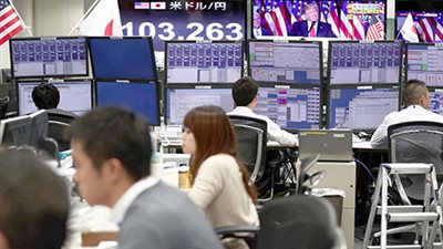 تحسن أسواق المال في آسيا بعد صمود البورصات الغربية أمام فوز ترامب