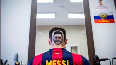 «صورة ميسي» أحدث تقليعة في قصات الشعر قبل المونديال (صور)