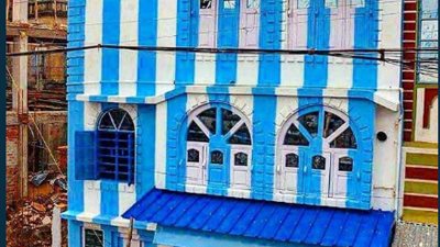 هندي يزين منزله بألوان المنتخب الأرجنتيني ويقدم الشاي للمشجعين (صور)