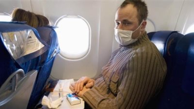 كيف تحمي نفسك من العدوى على متن الطائرة