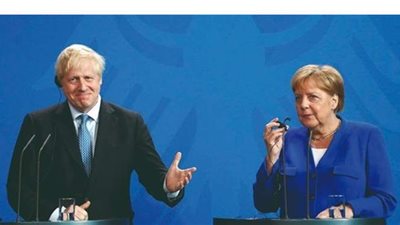 جونسون يعتزم التحدث مع ميركل بشأن الـ