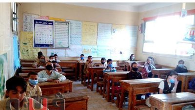 طلاب الدقهلية يتوافدون على المدارس بالكمامة في أول أيام الدراسة |  صور