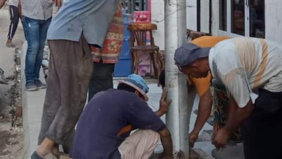 تركيب أعمدة إنارة بحي جنوب الجيزة | صور