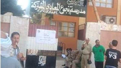 تأمينات مكثفة بمحيط لجان أسيوط في استقبال ناخبي مجلس النواب | صور