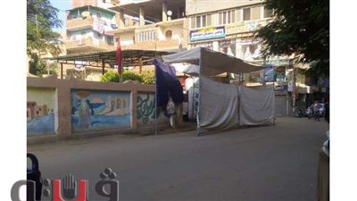 طابور يمتد لـ 30 مترا أمام مدرسة أنس بن مالك بالجيزة