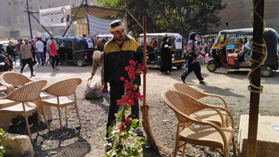 عمال نظافة الجيزة جنود مجهولون  في معركة الانتخابات